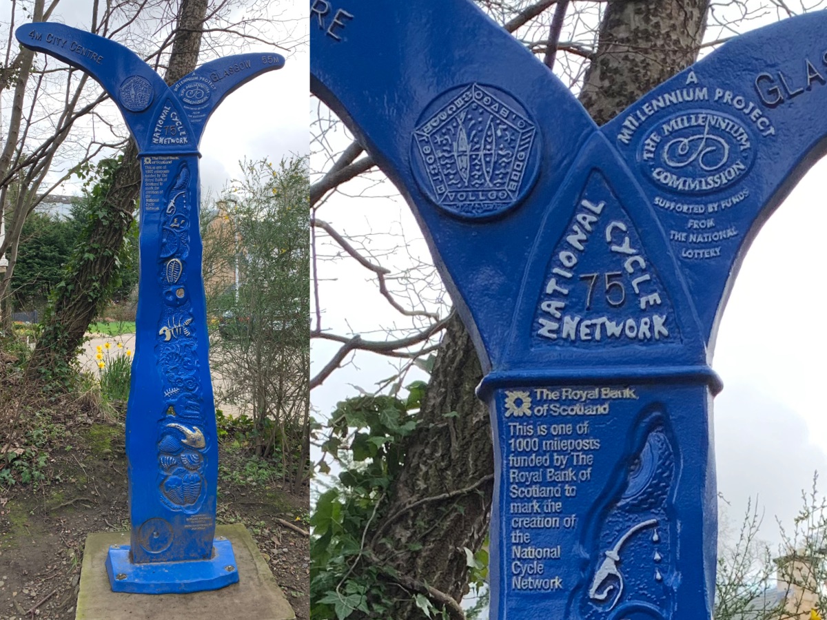 The mills milepost in Colinton. The milepost says "National Cycle Network 75", with the left side labelled "4 Miles City Centre", the right "55 Miles Glasgow". Additional text on the milepost describes the millennium milepost project.